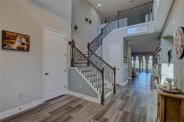 a view of entryway with wooden floor