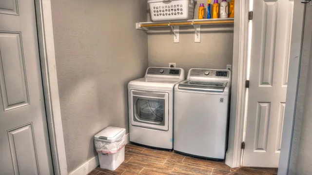 a utility room with dryer and washer