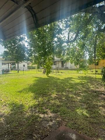 850 Northwest 84th Street Miami, FL 33150 - Photo 9 of 10 a view of a field with an outdoor space