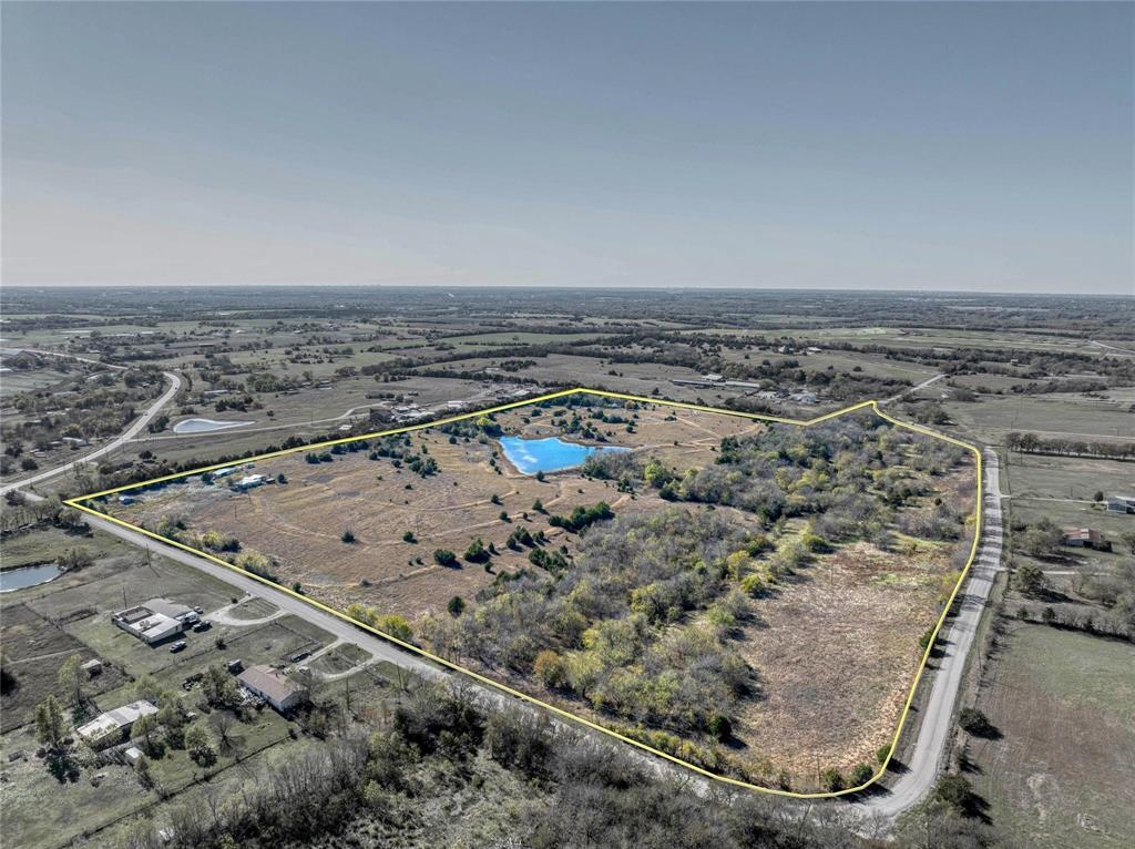 10420 County Road 470 Blue Ridge, TX 75424 - Photo 5 of 24 an aerial view of a house with a yard