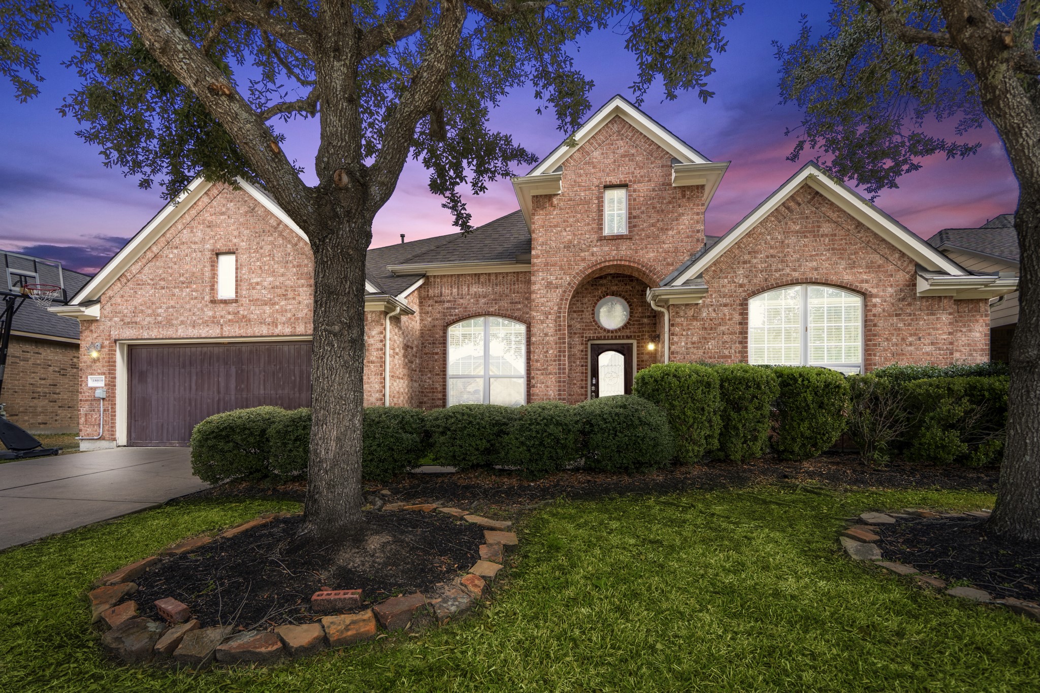 18010 Sheldon Pines offers an ideal location in Spring, Texas with beautiful curb appeal of established landscaping.