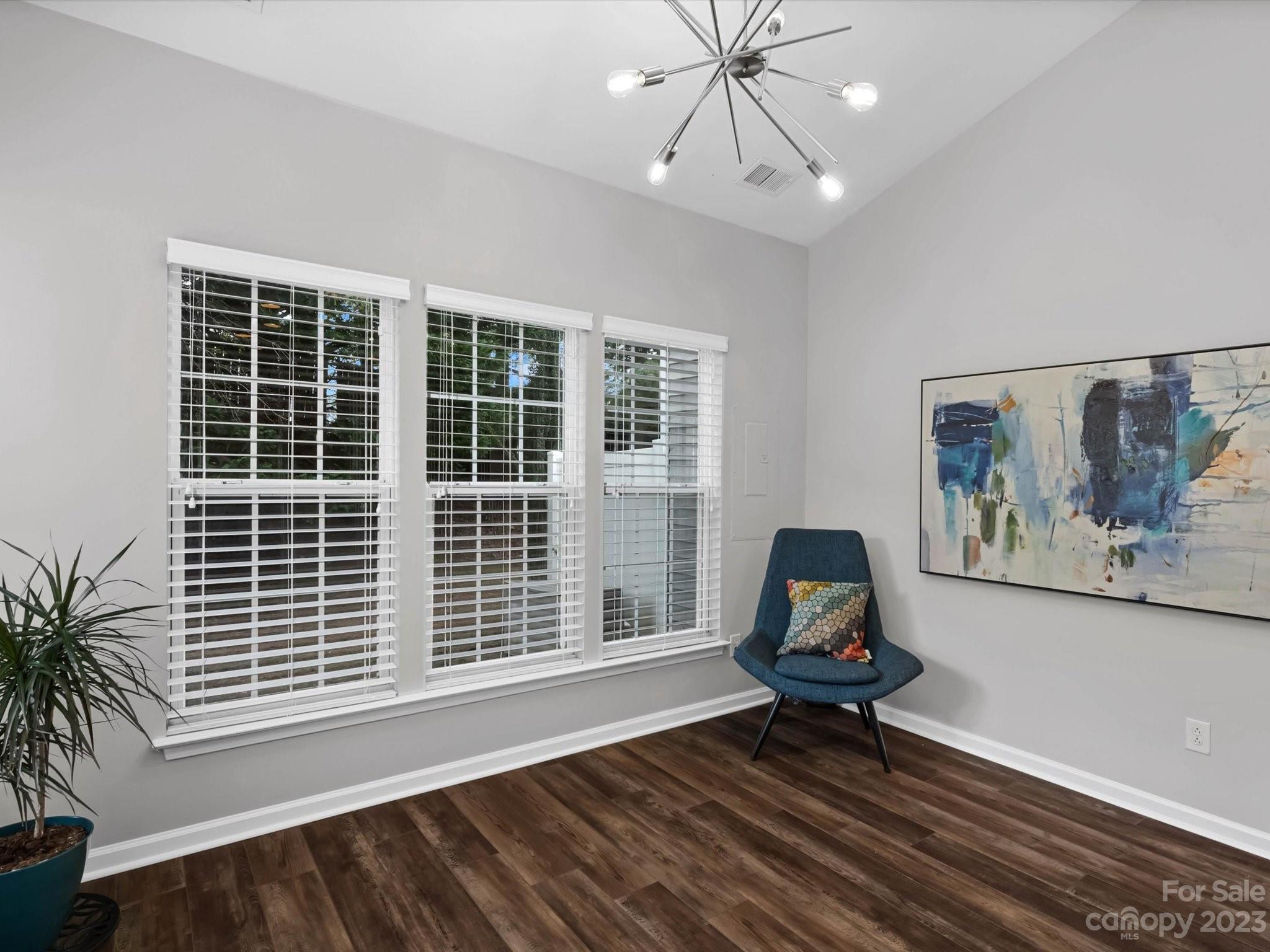 7902 Mariners Pointe Circle Denver, NC 28037 - Photo 11 of 42 a living room with furniture and a large window