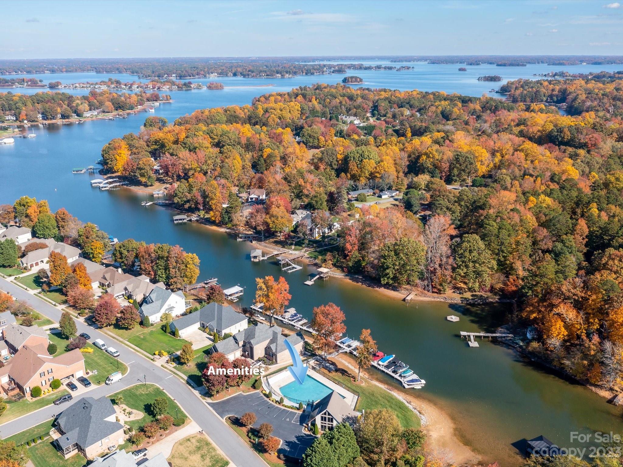 7902 Mariners Pointe Circle Denver, NC 28037 - Photo 3 of 42 an aerial view of lake residential house with swimming pool and outdoor space