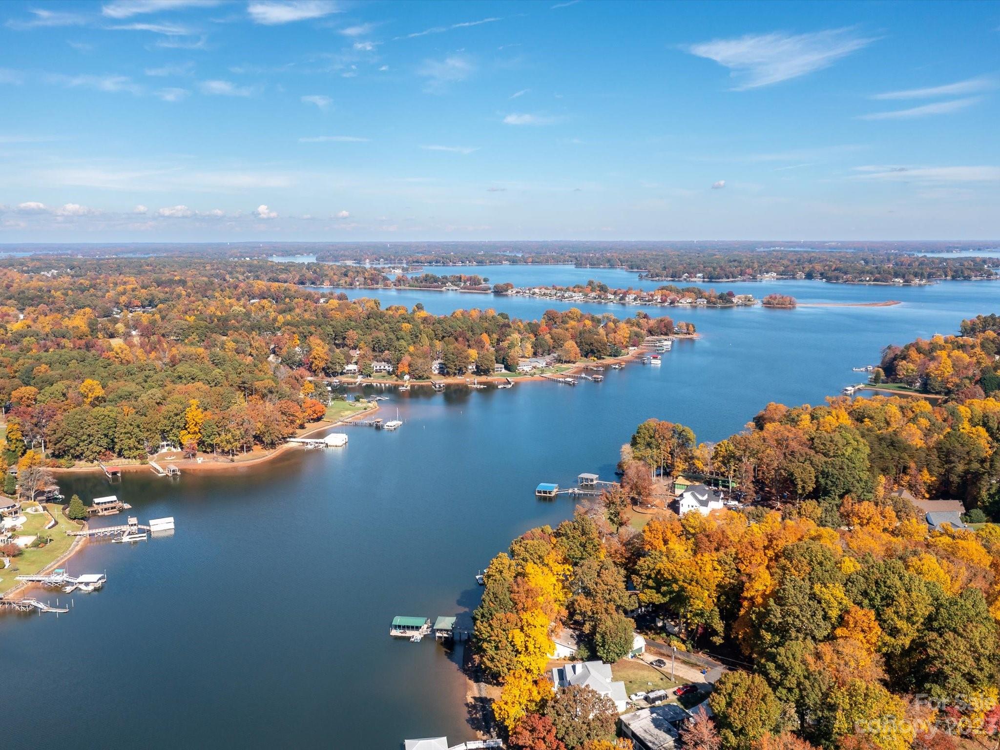 7902 Mariners Pointe Circle Denver, NC 28037 - Photo 4 of 42 an aerial view of ocean and residential houses with outdoor space