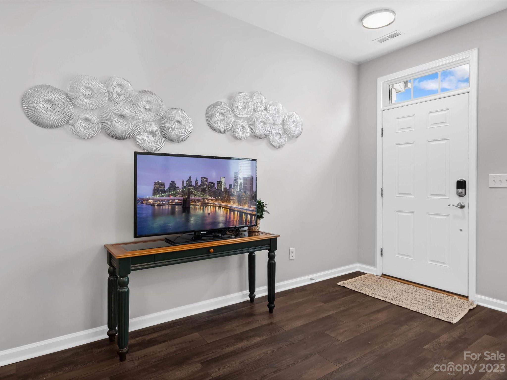7902 Mariners Pointe Circle Denver, NC 28037 - Photo 9 of 42 a view of room with wooden floor and fan