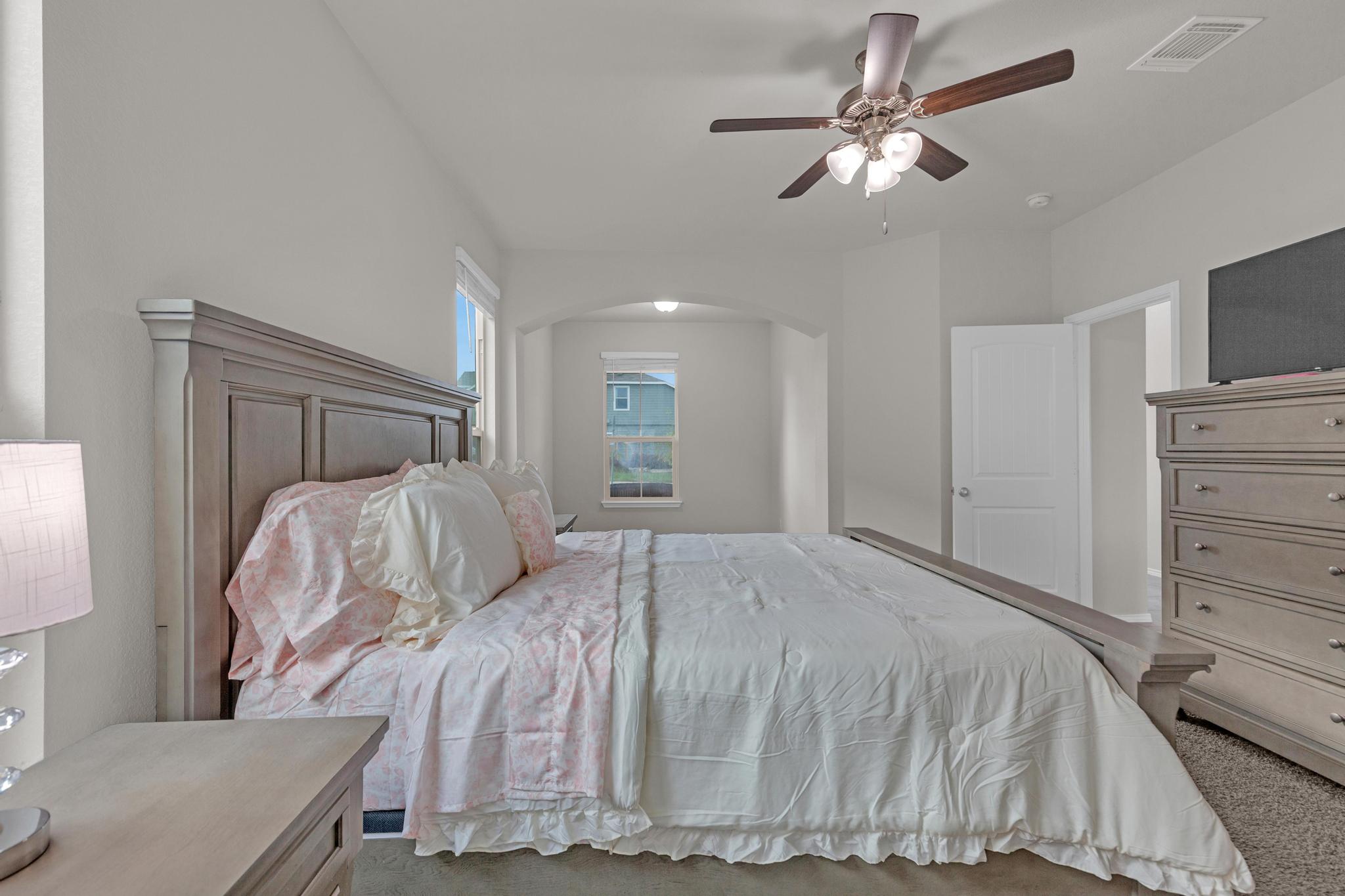 104 Uncle Billy Way Jarrell, TX 76537 - Photo 11 of 38 A quiet retreat with neutral tones and ample natural light, creating a serene personal sanctuary.