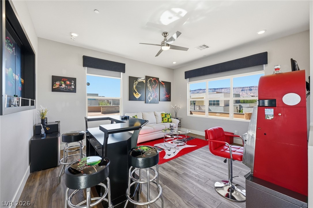 4246 Swift Street Las Vegas, NV 89135 - Photo 28 of 71 Game room with wood finished floors, a ceiling fan, and recessed lighting