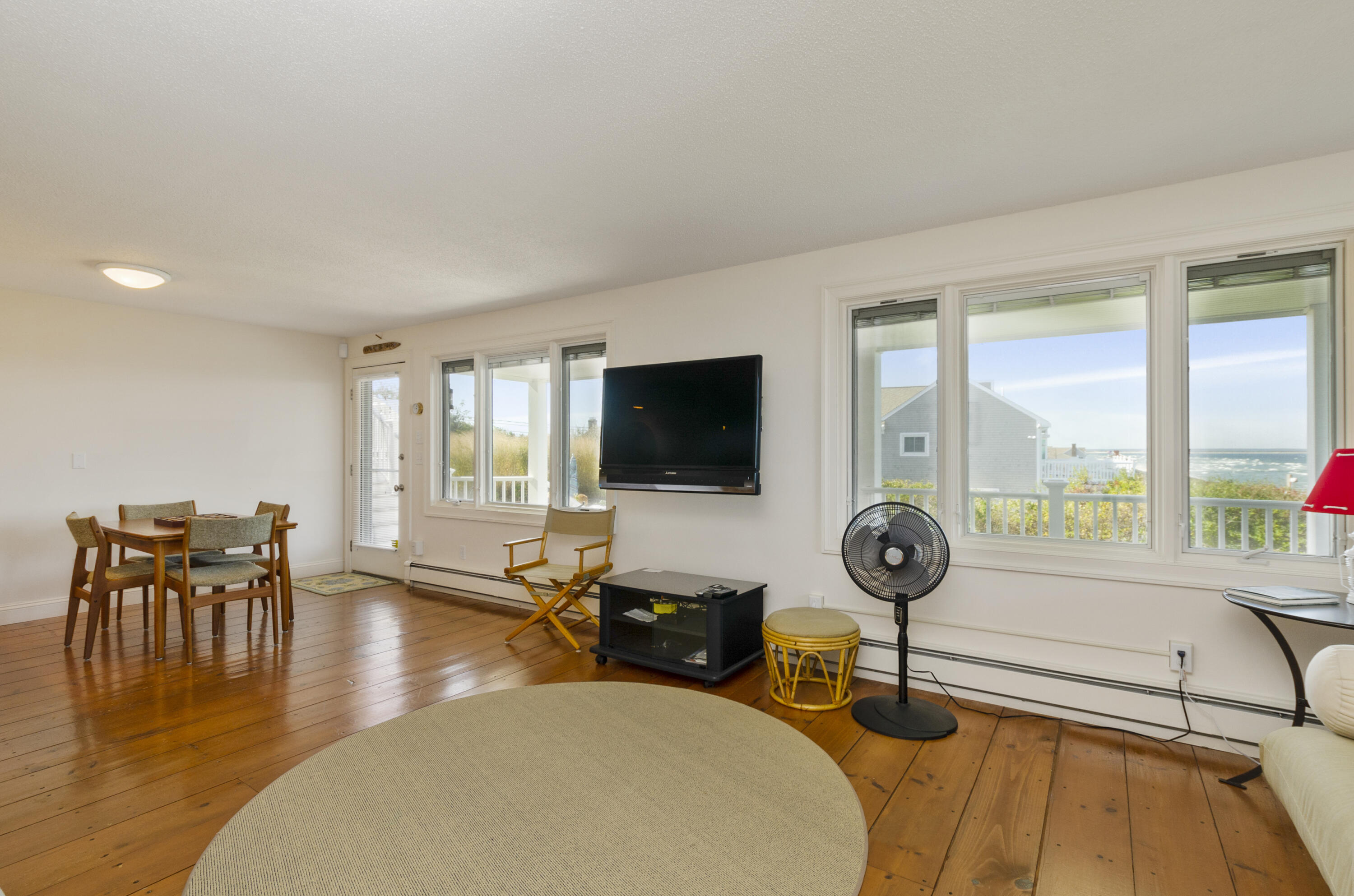96 Shore Drive Dennis, MA 02638 - Photo 24 of 37 a living room with furniture and a flat screen tv