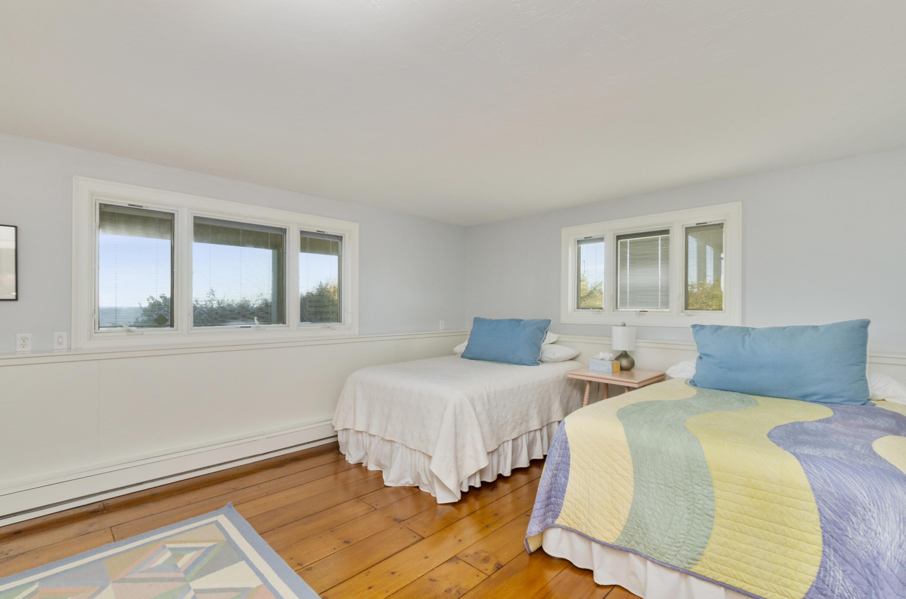 96 Shore Drive Dennis, MA 02638 - Photo 28 of 37 a bedroom with two beds and a window with outer view