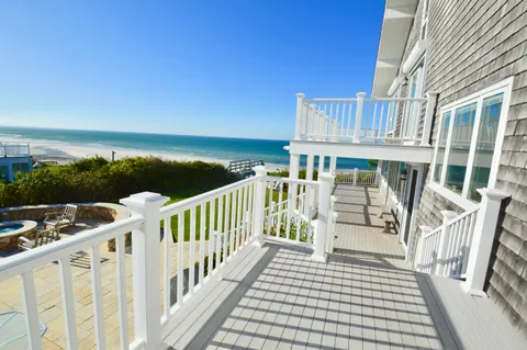a view of a swimming pool with lounge chair