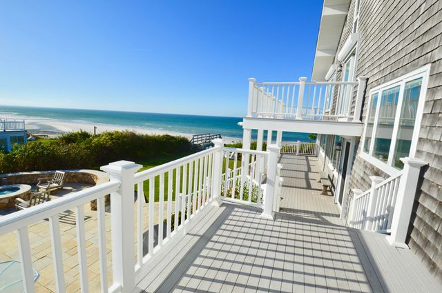 a view of a swimming pool with lounge chair