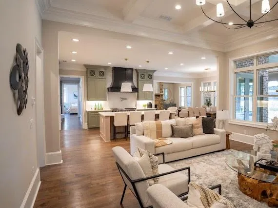 a living room with furniture and a rug