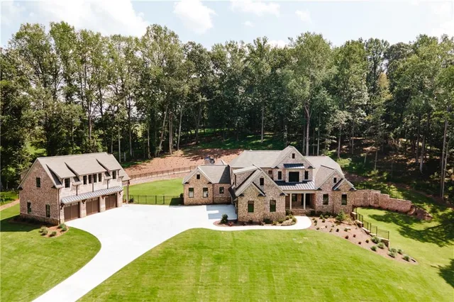 a view of a lake with a yard