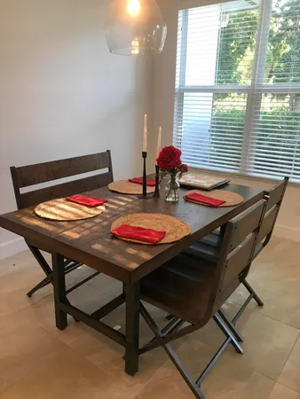 a table and chairs in a room