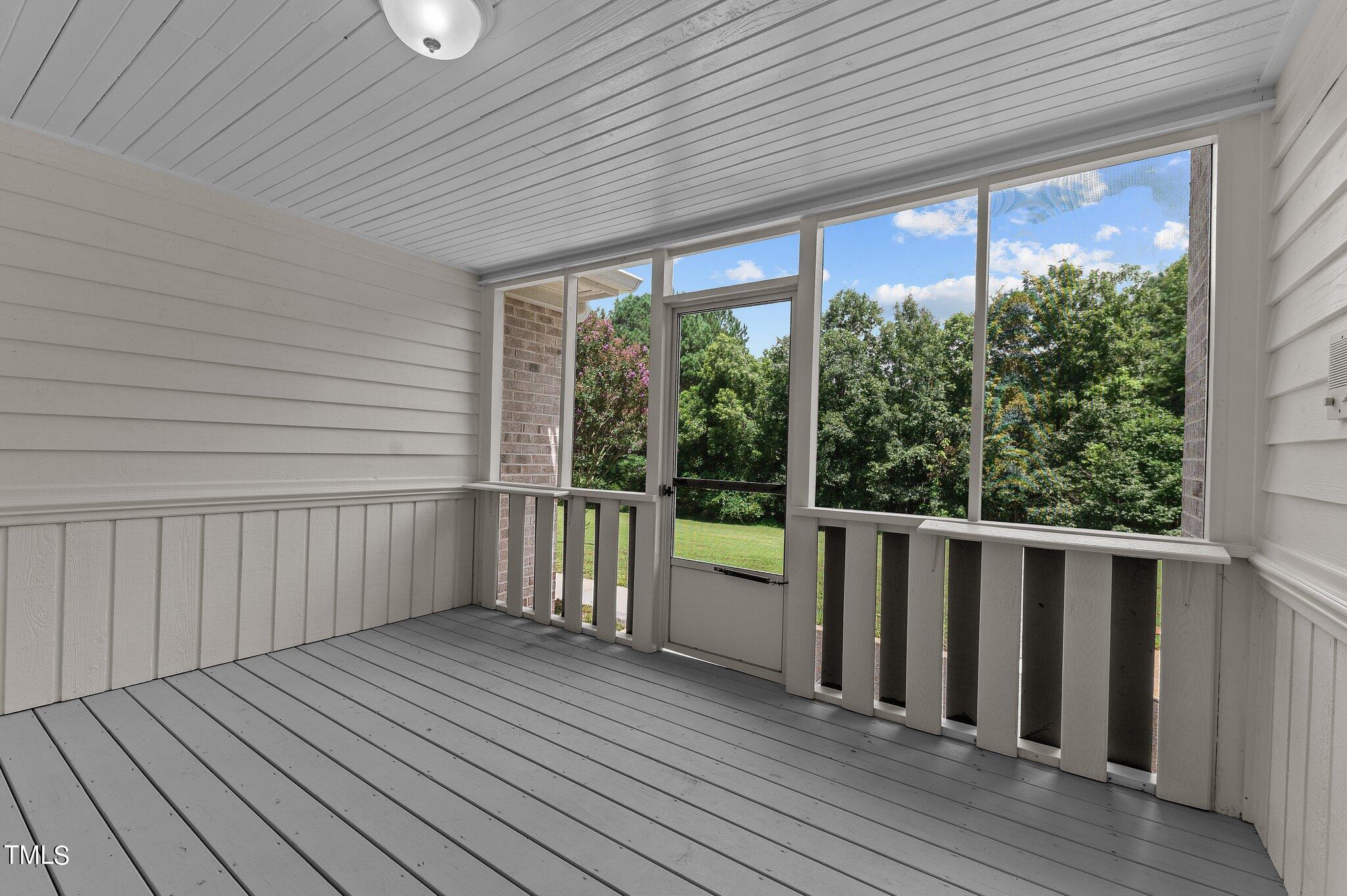 1609 Old Keith Road Wake Forest, NC 27587 - Photo 27 of 81 an empty room with wooden floor and windows