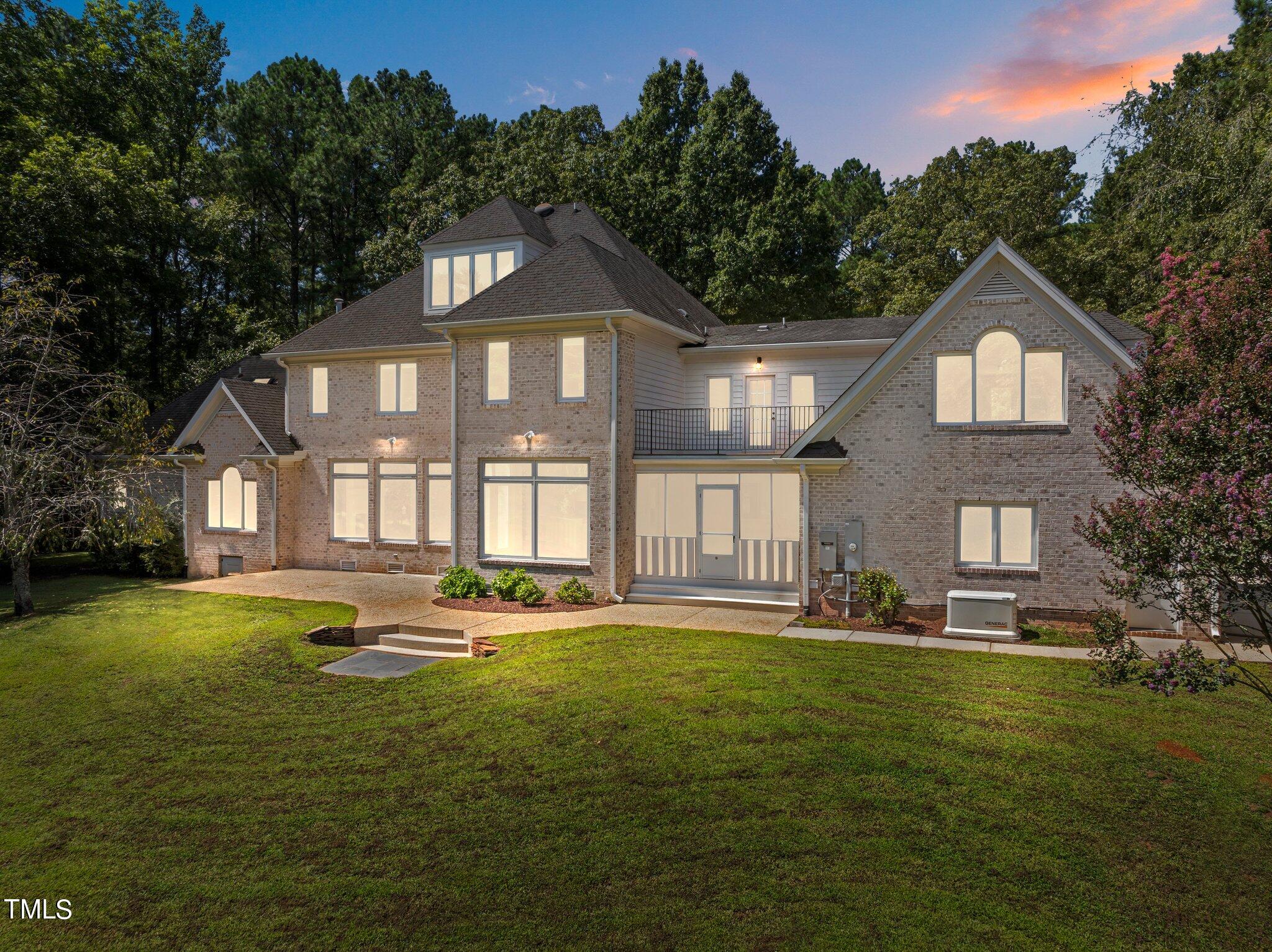 1609 Old Keith Road Wake Forest, NC 27587 - Photo 66 of 81 a front view of a house with garden