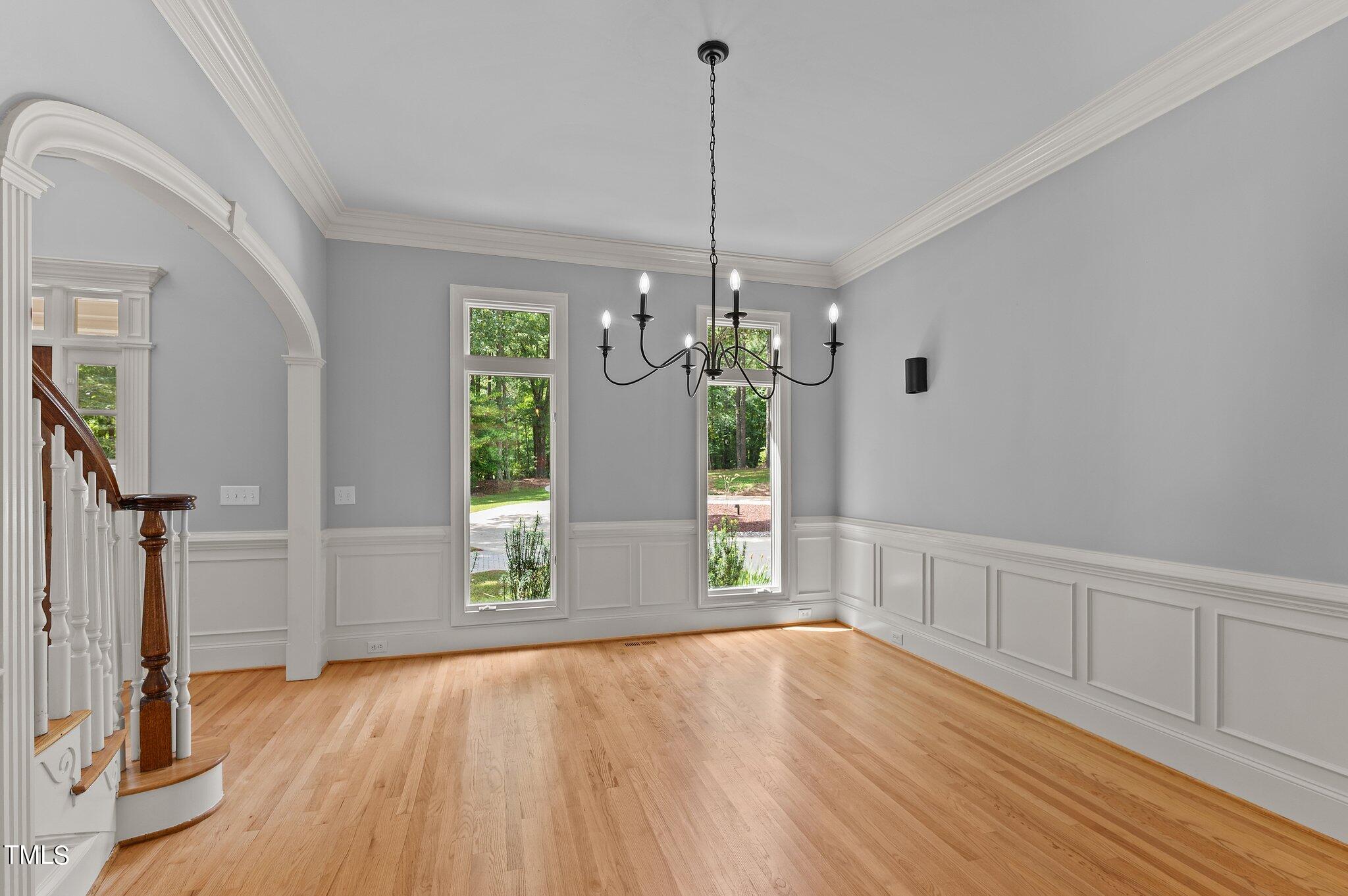 1609 Old Keith Road Wake Forest, NC 27587 - Photo 8 of 81 a view of an empty room with window and wooden floor