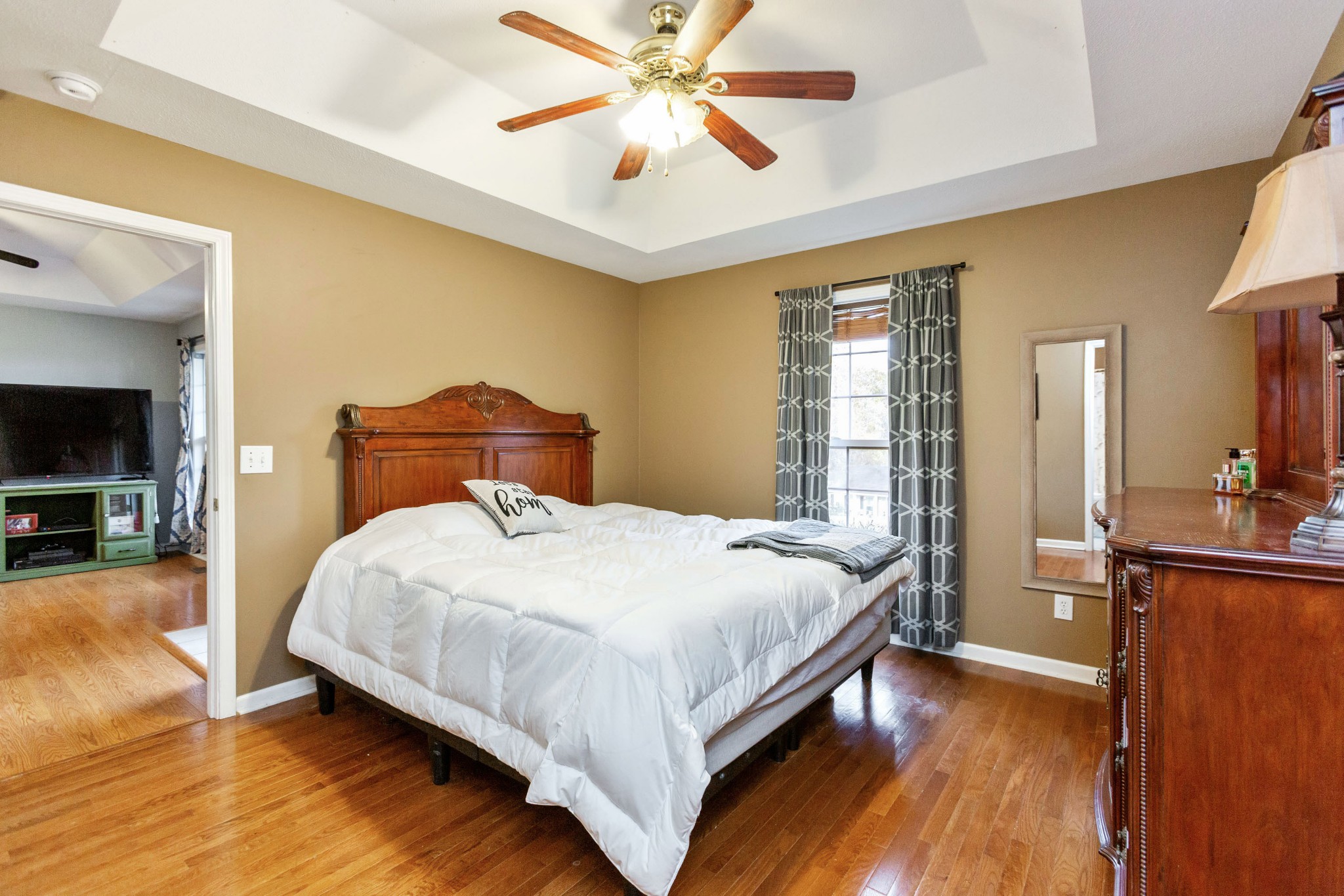 4382 Airport Road Springfield, TN 37172 - Photo 11 of 31 a bedroom with a bed and wooden floor