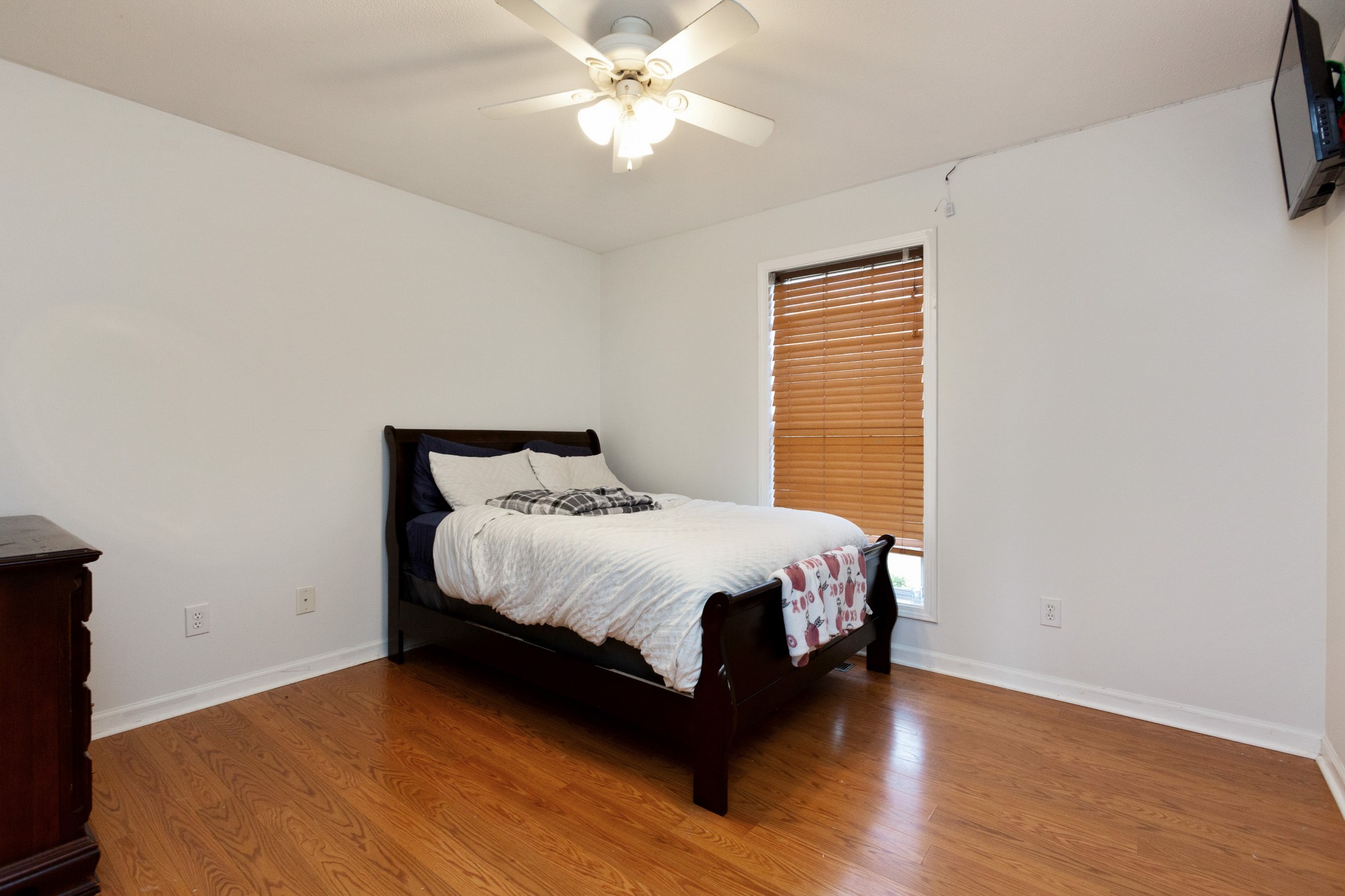 4382 Airport Road Springfield, TN 37172 - Photo 15 of 31 a bedroom with a bed and a chandelier