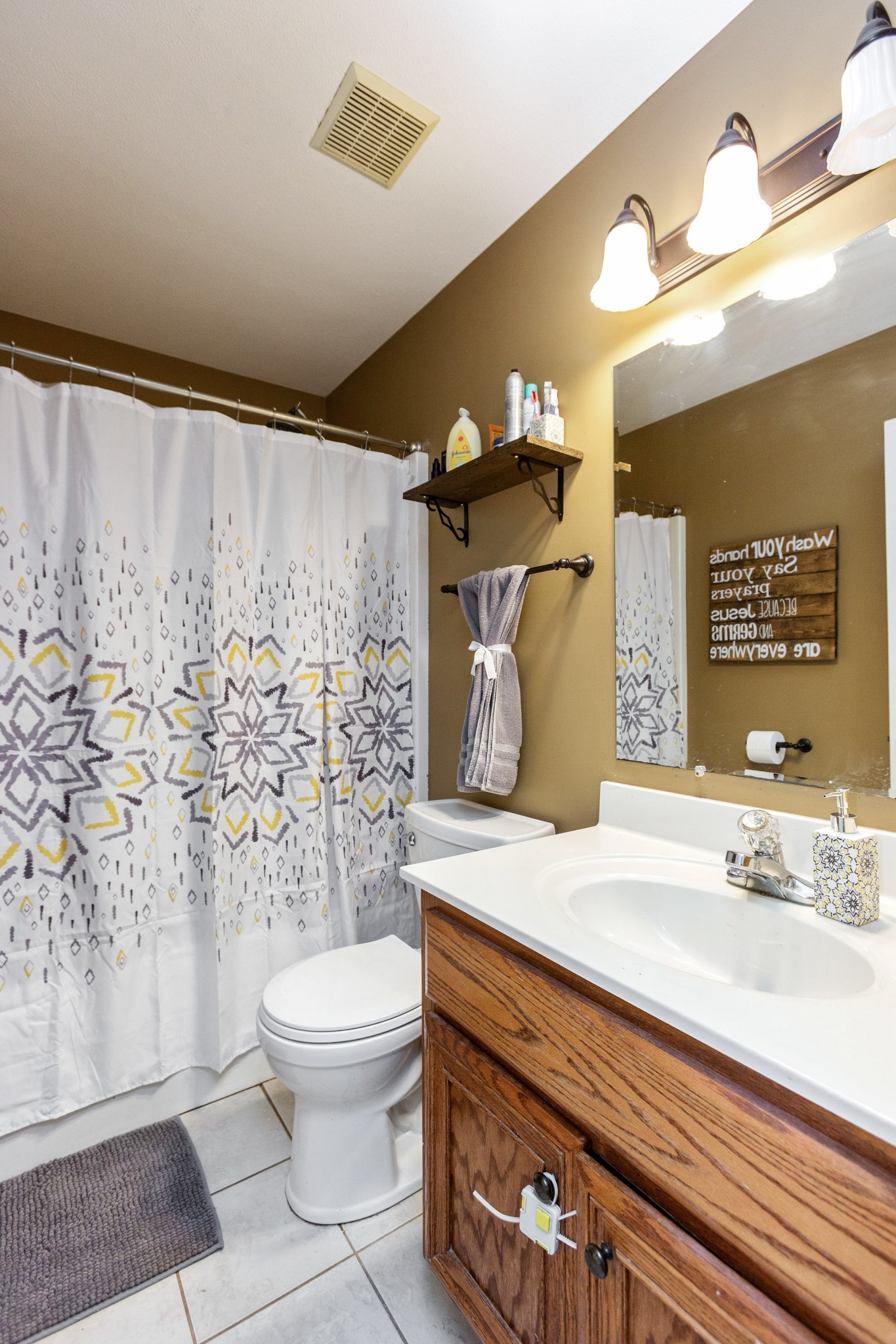 4382 Airport Road Springfield, TN 37172 - Photo 18 of 31 a bathroom with a sink toilet and shower
