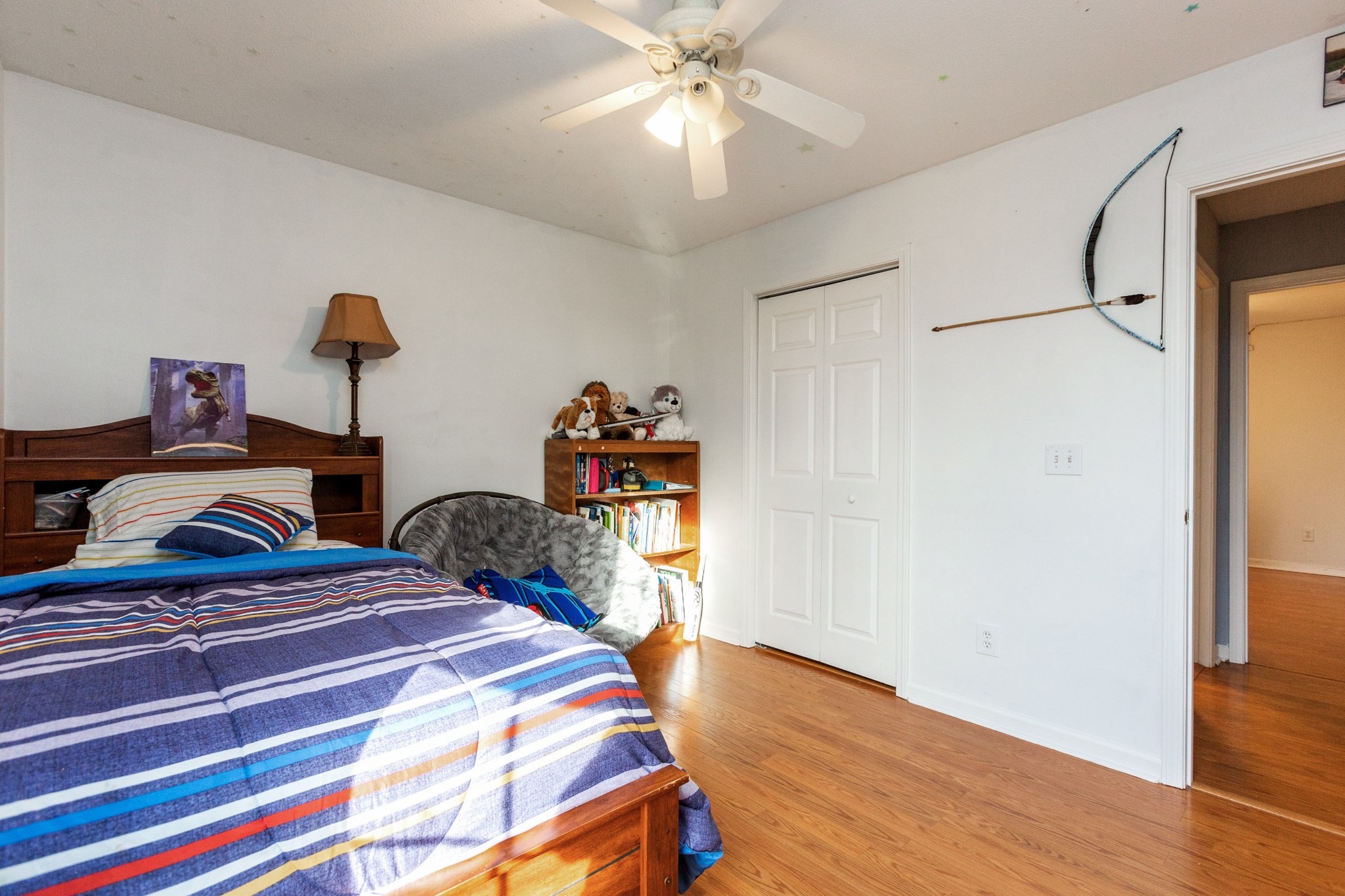 4382 Airport Road Springfield, TN 37172 - Photo 20 of 31 a bedroom with a bed and wooden floor