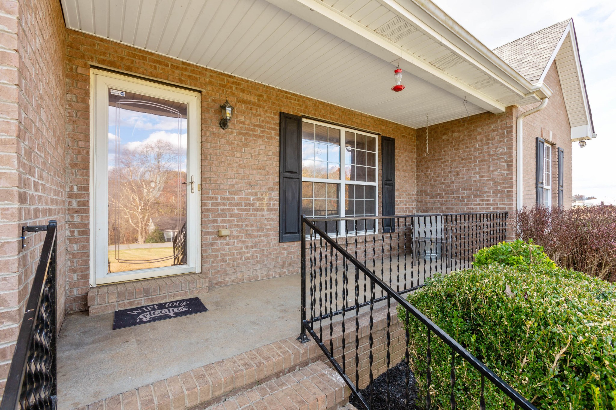 4382 Airport Road Springfield, TN 37172 - Photo 26 of 31 a view of a balcony with floor to ceiling windows and wooden floor