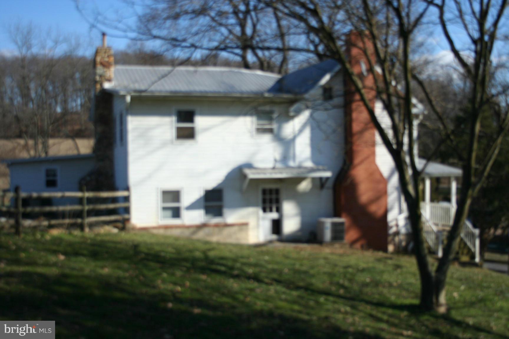 6028 Old Bohn Road Mount Airy, MD 21771 - Photo 3 of 9 a view of house with a yard