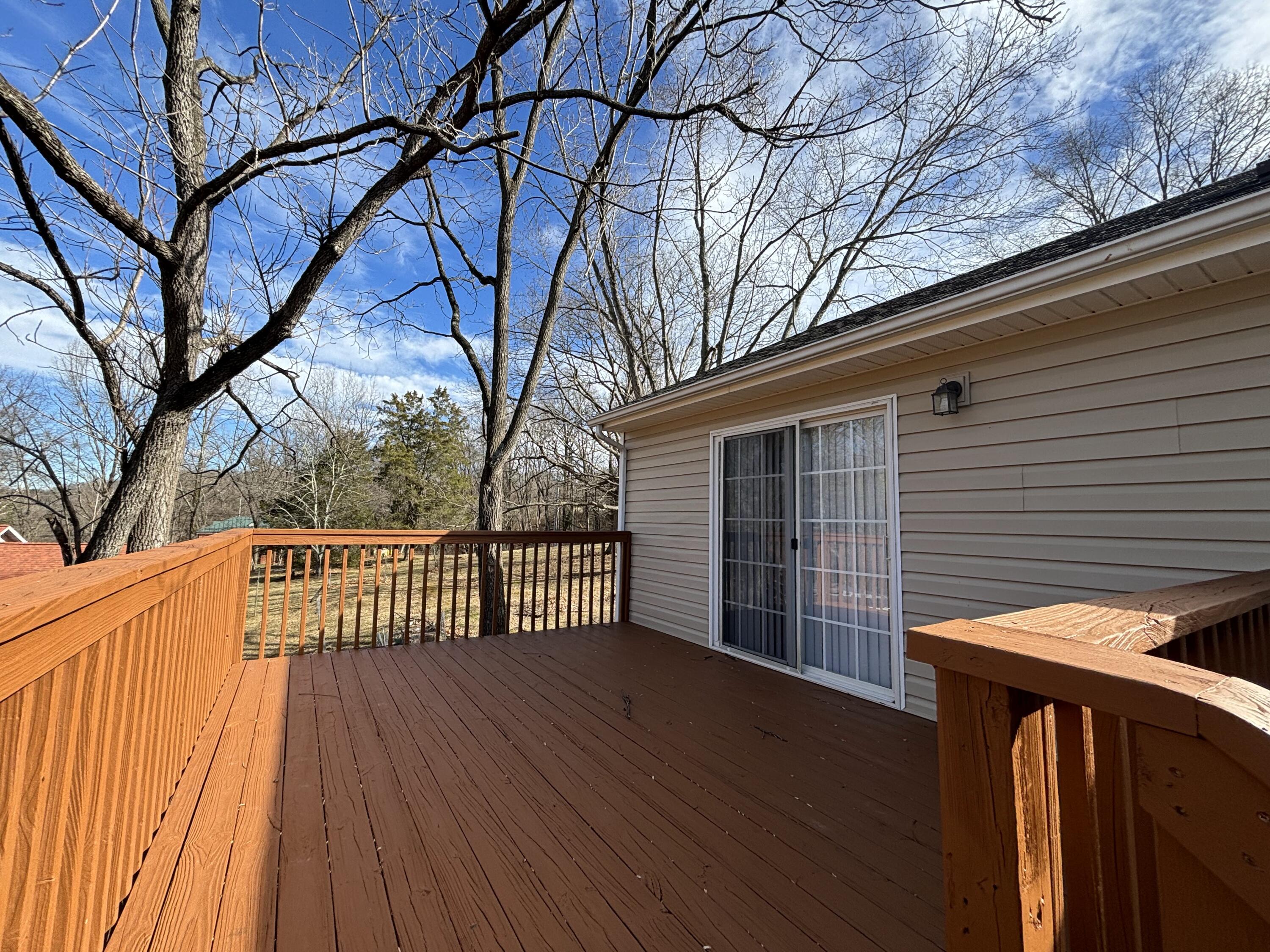 2719 Bandy Road Roanoke, VA 24014 - Photo 28 of 33 a view of a backyard with wooden fence and large trees