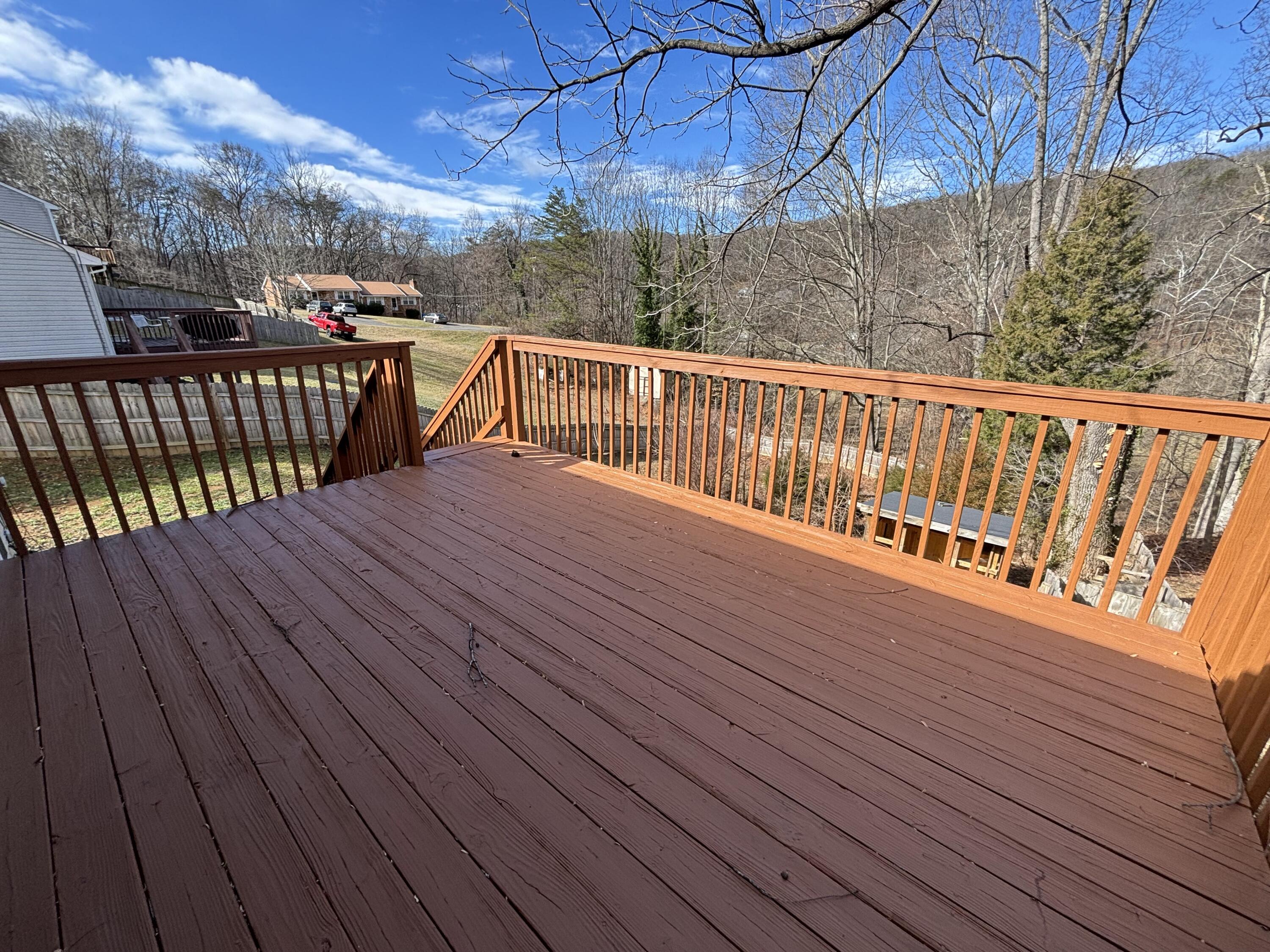 2719 Bandy Road Roanoke, VA 24014 - Photo 30 of 33 a balcony with wooden floor and outdoor seating