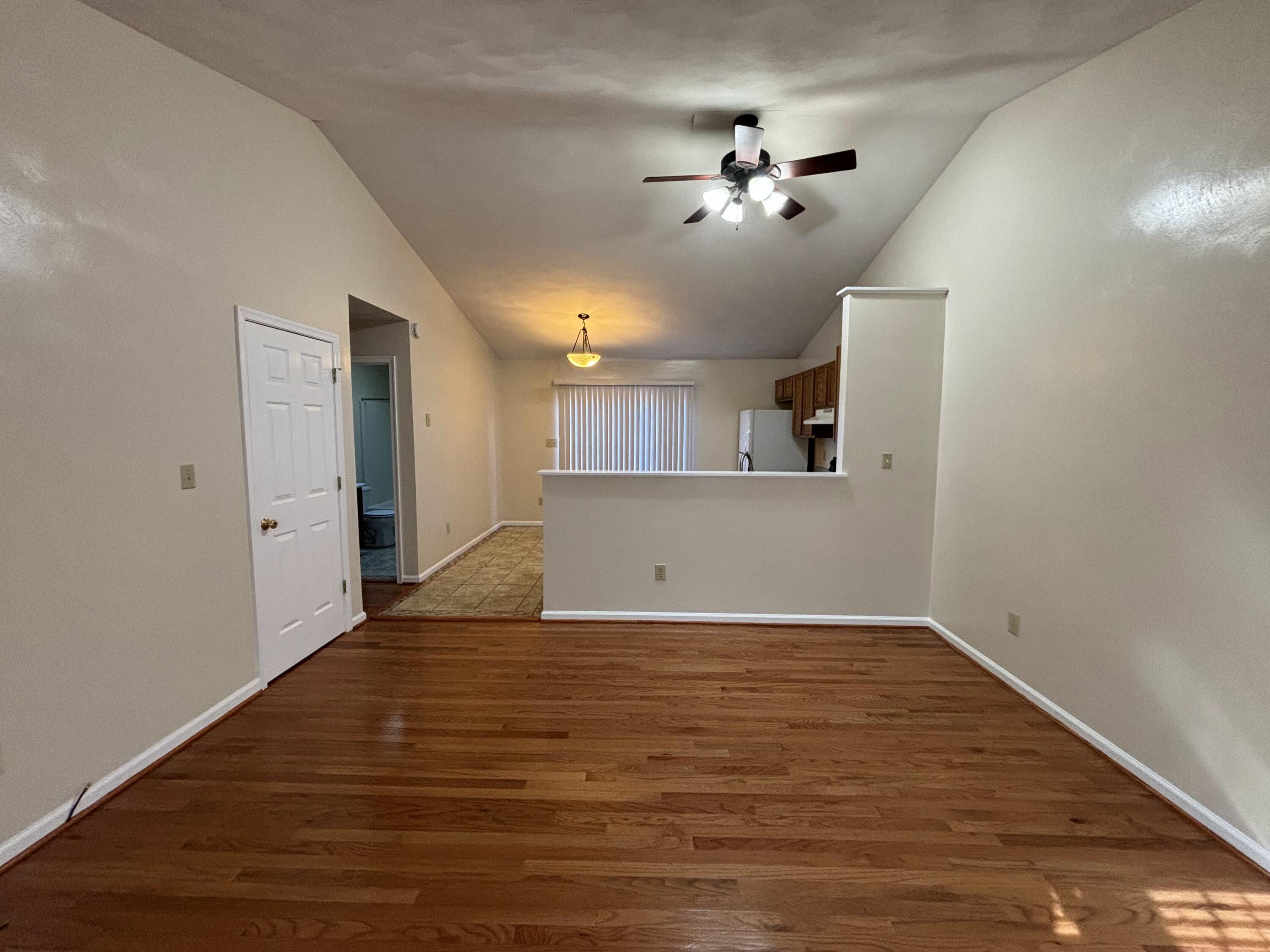 2719 Bandy Road Roanoke, VA 24014 - Photo 5 of 33 a view of empty room with wooden floor and fan