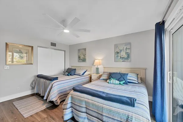 a view of a chairs and table in the balcony