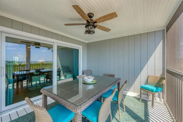 a balcony with wooden floor