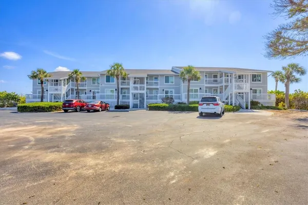 a cars parked in front of a building