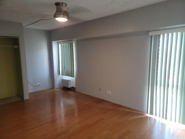 an empty room that has a window