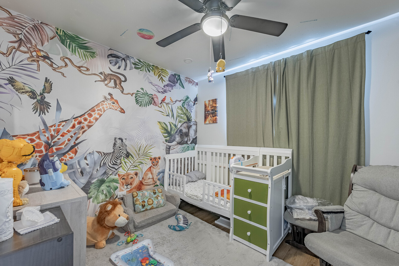 7747 West 62nd Street Summit, IL 60501 - Photo 13 of 23 a bedroom with a bed and a chandelier
