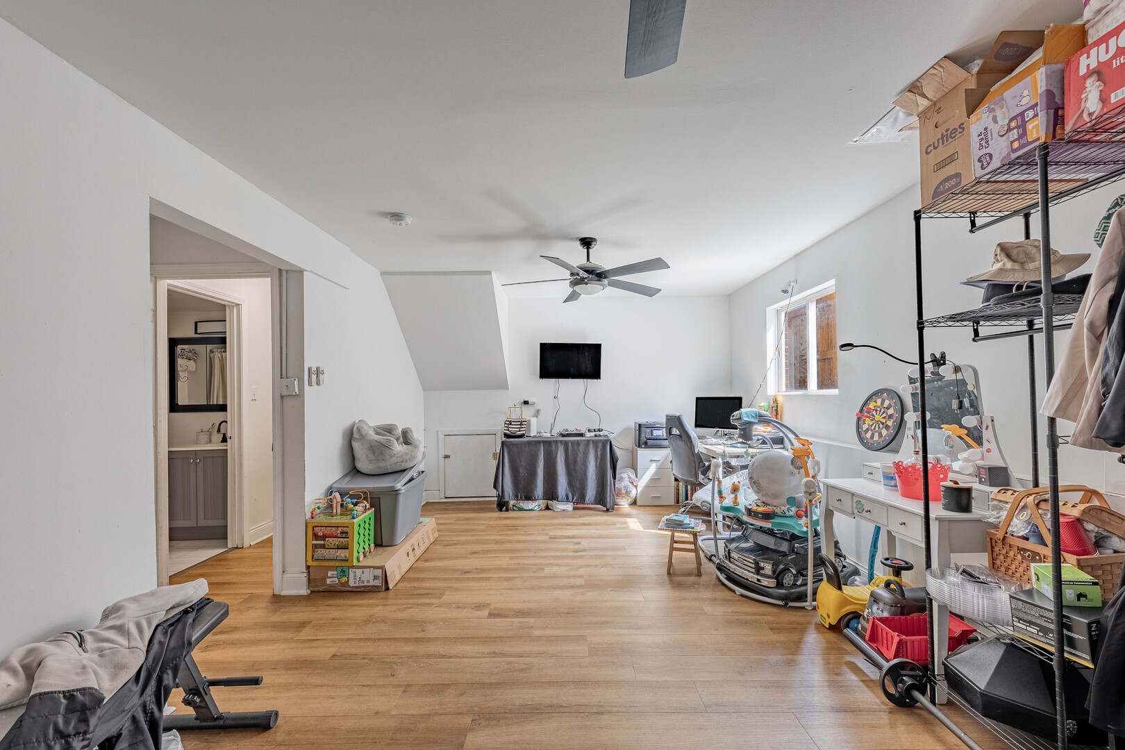 7747 West 62nd Street Summit, IL 60501 - Photo 17 of 23 a living room with furniture and a flat screen tv