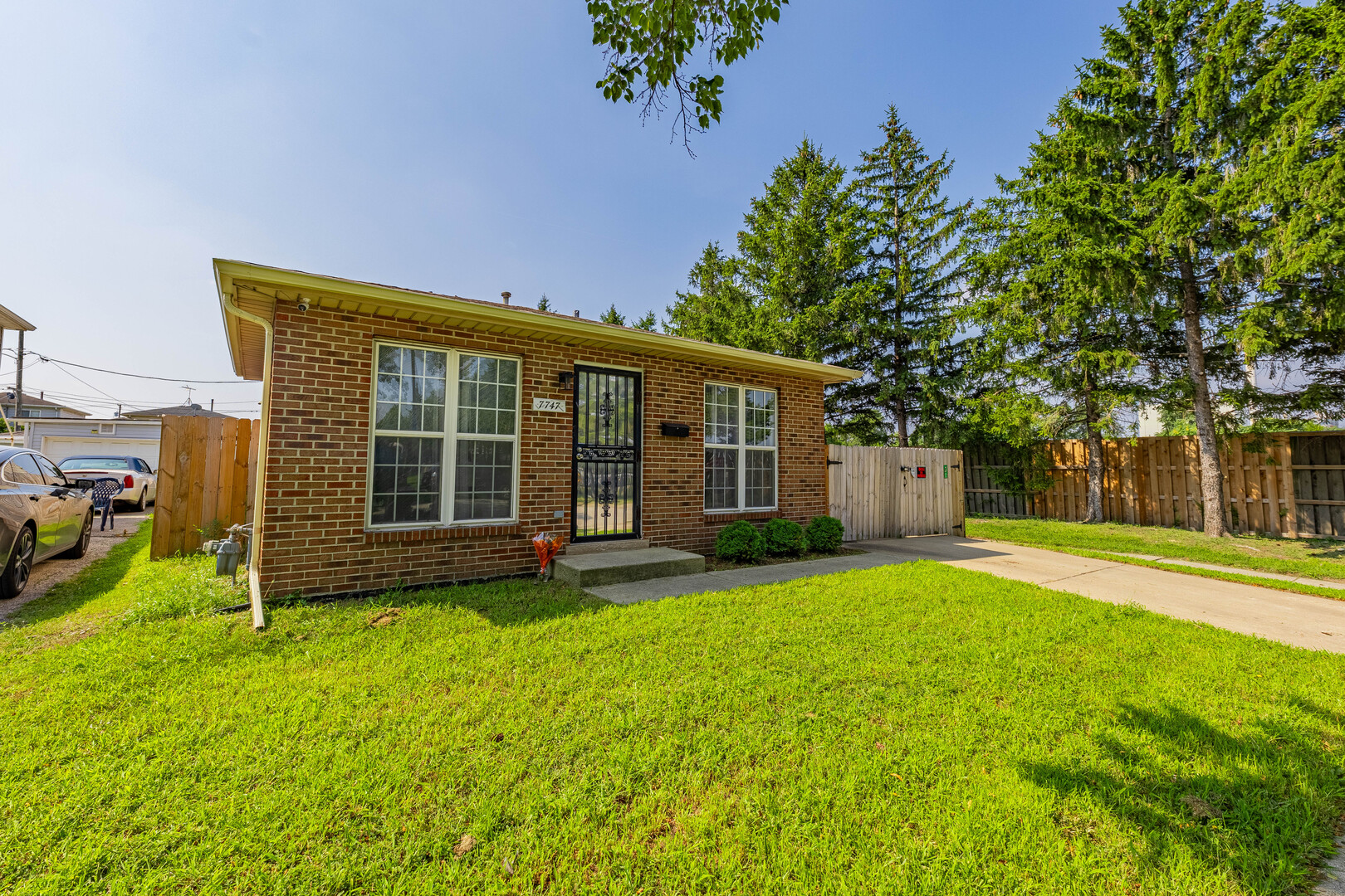 7747 West 62nd Street Summit, IL 60501 - Photo 2 of 23 a view of a house with a yard