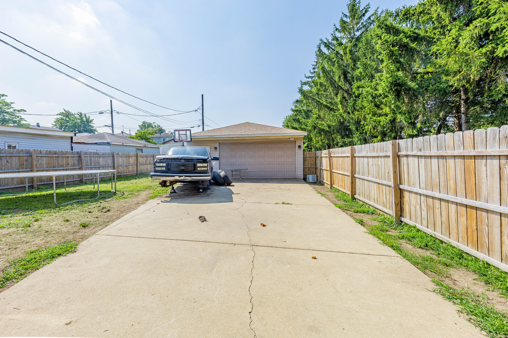 7747 West 62nd Street Summit, IL 60501 - Photo 22 of 23 a view of a terrace with wooden fence