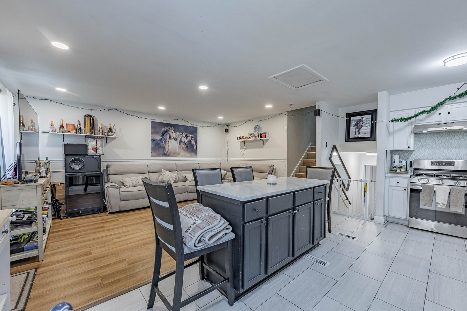 7747 West 62nd Street Summit, IL 60501 - Photo 5 of 23 a open kitchen with stainless steel appliances granite countertop a stove and a refrigerator