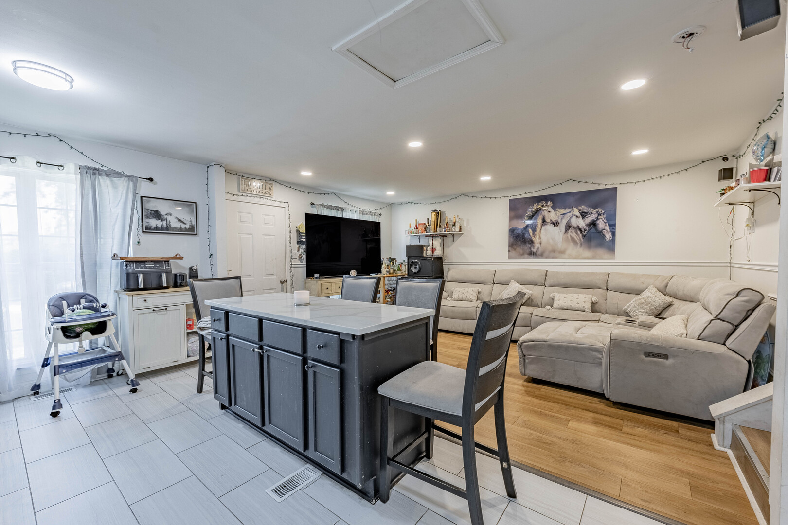 7747 West 62nd Street Summit, IL 60501 - Photo 6 of 23 a living room with furniture and view of kitchen