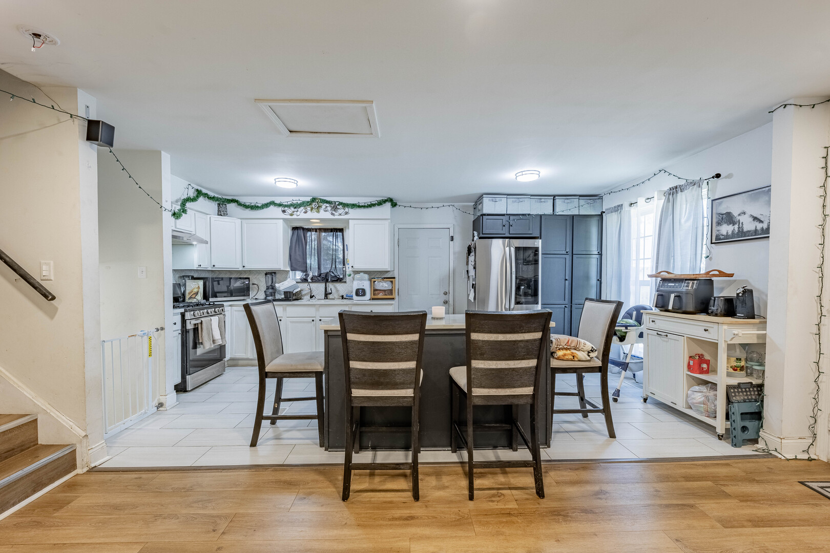 7747 West 62nd Street Summit, IL 60501 - Photo 7 of 23 a view of a dining room with furniture and wooden floor