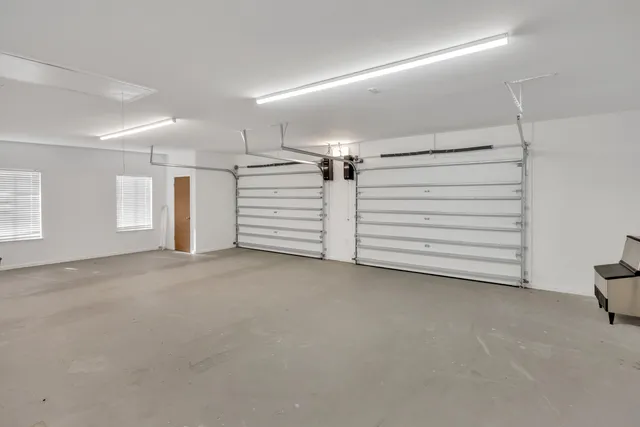 a view of multiple houses with a yard