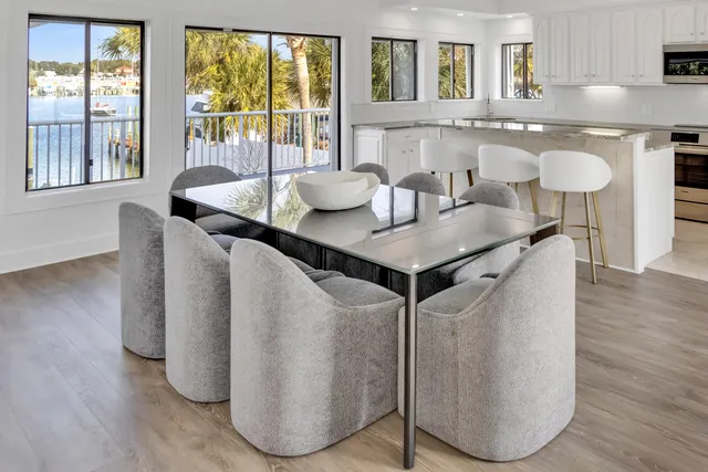 a bedroom with furniture and a gym machine