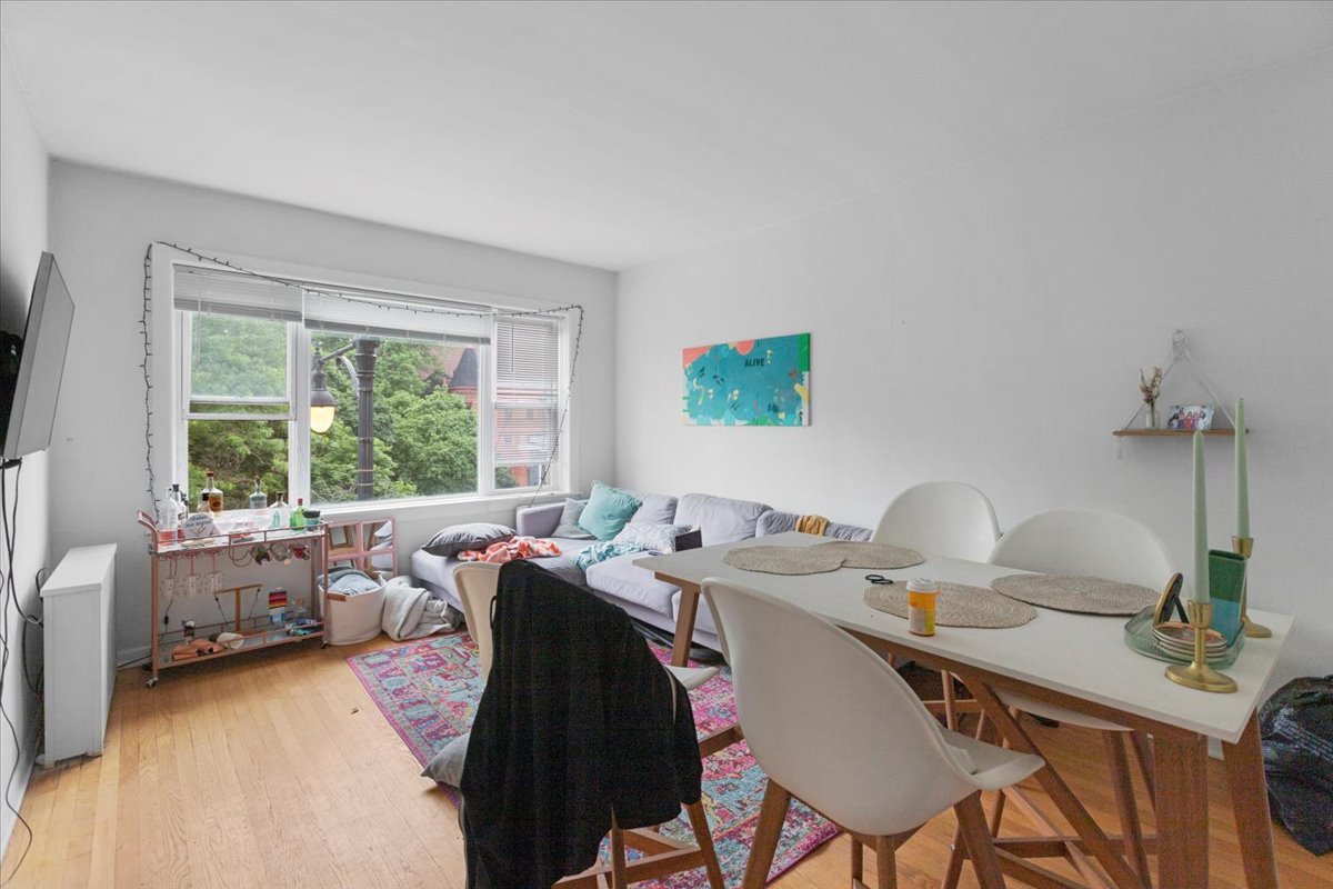 2453 North Clark Street, Unit 3 Chicago, IL 60614 - Photo 5 of 11 a view of a workspace with furniture and a window