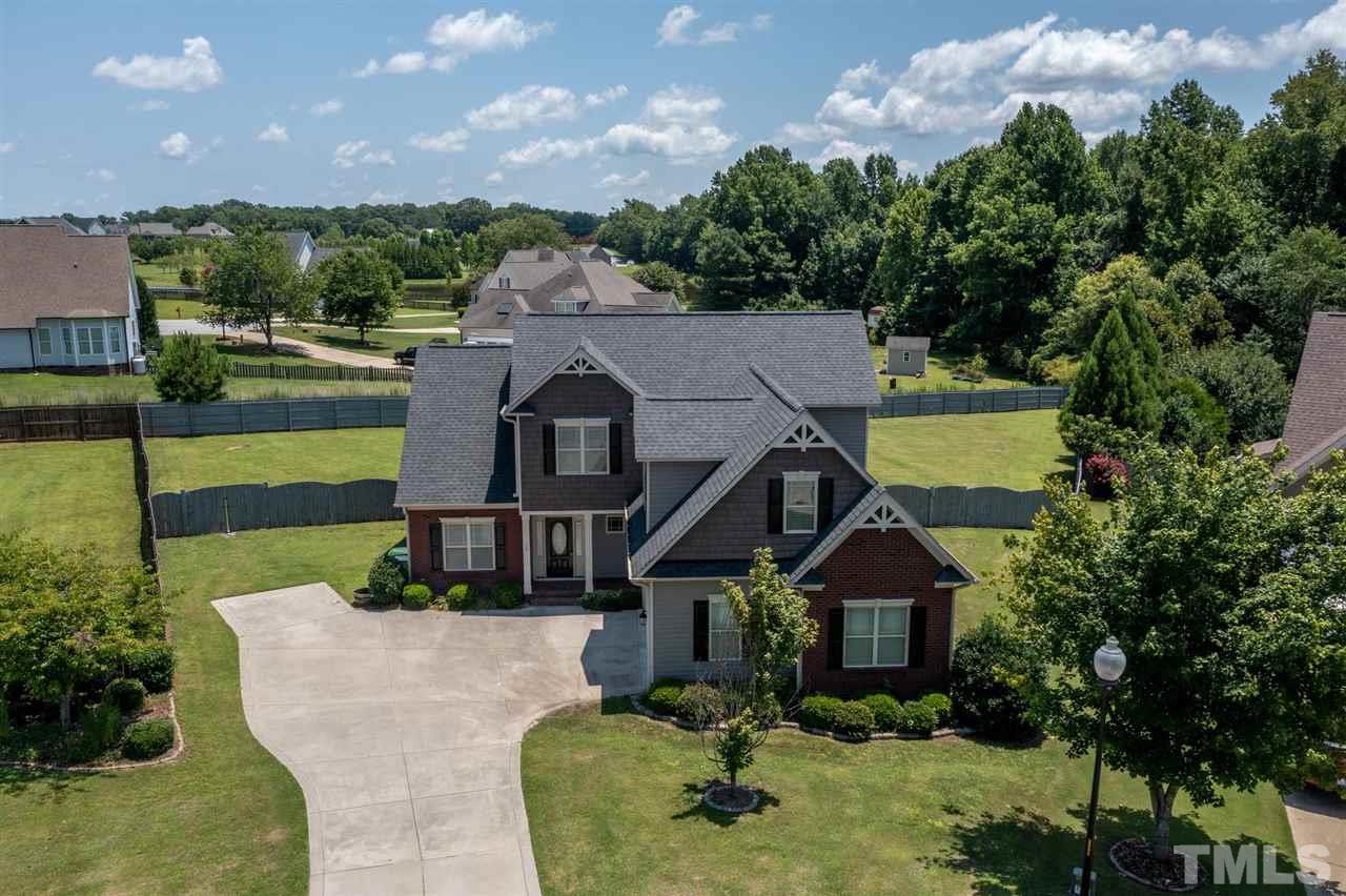 95 South Sunset Ridge Drive Willow Spring, NC 27592 - Photo 24 of 24 an aerial view of a house