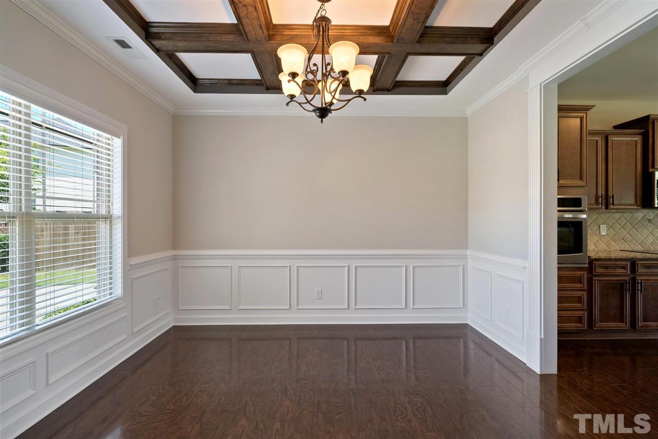95 South Sunset Ridge Drive Willow Spring, NC 27592 - Photo 8 of 24 a view of an empty room with a window