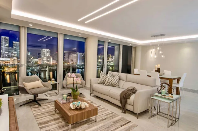 a living room with furniture and a table