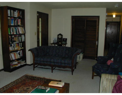 300 Petersham Road Hardwick, MA 01037 - Photo 10 of 19 a living room with furniture and a book shelf
