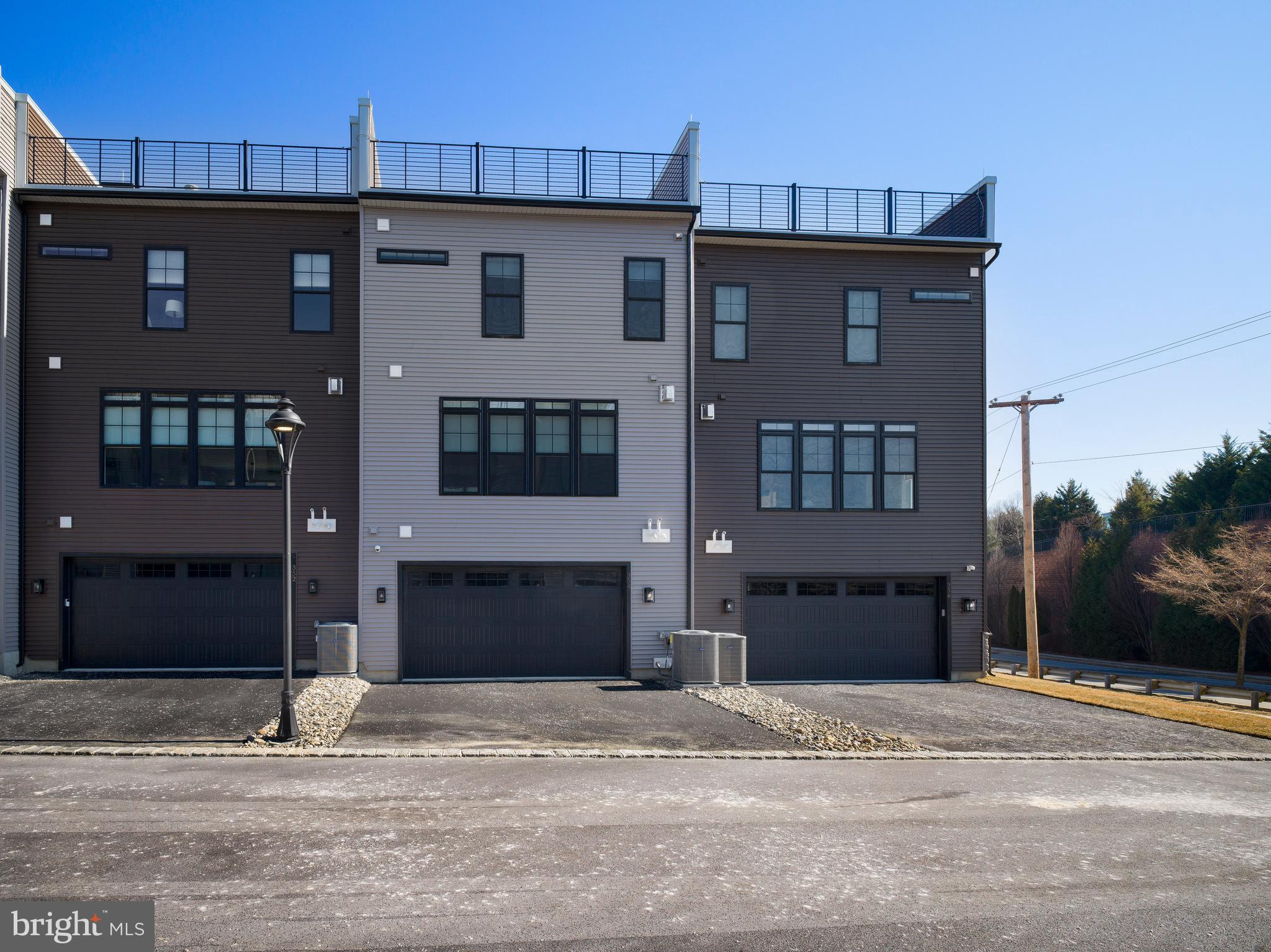 354 Paddock Circle Newtown Square, PA 19073 - Photo 31 of 36 a front view of a house with a yard