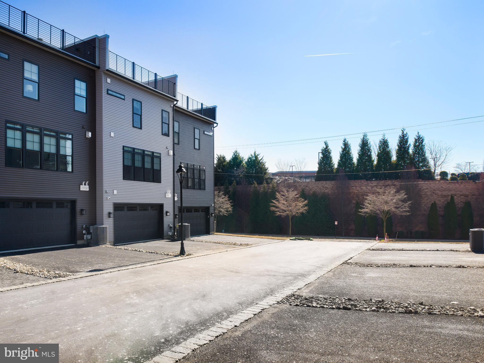 354 Paddock Circle Newtown Square, PA 19073 - Photo 32 of 36 a view of a house with a snow in the background